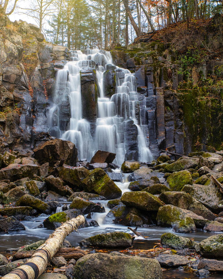 Waterfalls cascade in autumn season colors in the forest near Vladivostok